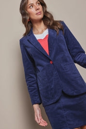 Model Madeline wearing size 10 of the Corduroy Blazer in colour Dustyblue (Blue), from the front, cropped image