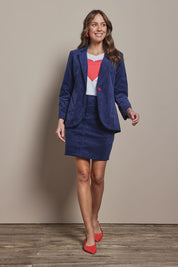 Model Madeline wearing size 10 of the Corduroy Blazer in colour Dustyblue (Blue), from the front, showing the whole outfit