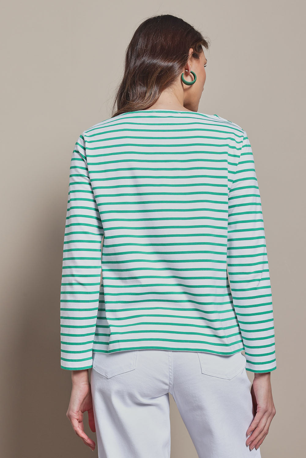 Model Madeline wearing size 10 of the Cotton Stripe Long Sleeve Top in colour Whitegreen (Green), from the back