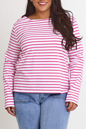 Model Ashleigh wearing size 16 of the Cotton Stripe Long Sleeve Top in colour Whitepink (Pink), from the front, cropped image