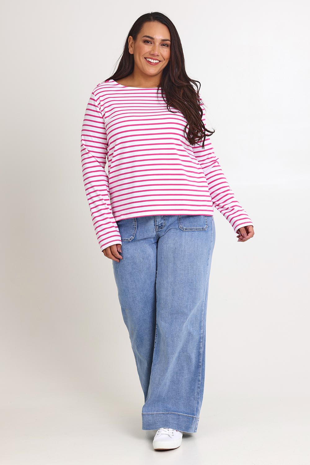 Model Ashleigh wearing size 16 of the Cotton Stripe Long Sleeve Top in colour Whitepink (Pink), from the front, showing the whole outfit