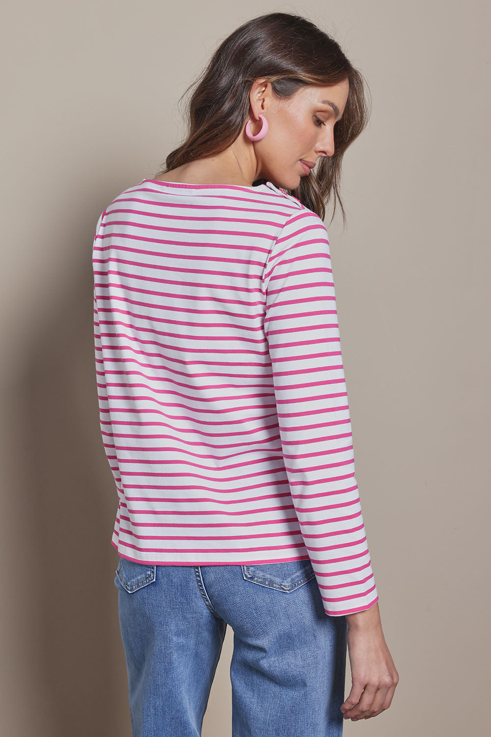 Model Madeline wearing size 10 of the Cotton Stripe Long Sleeve Top in colour Whitepink (Pink), from the back