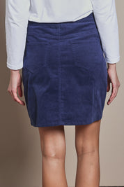Model Madeline wearing size 10 of the Corduroy Ain colourLine Mini Skirt - Dustyblue (Blue), from the back