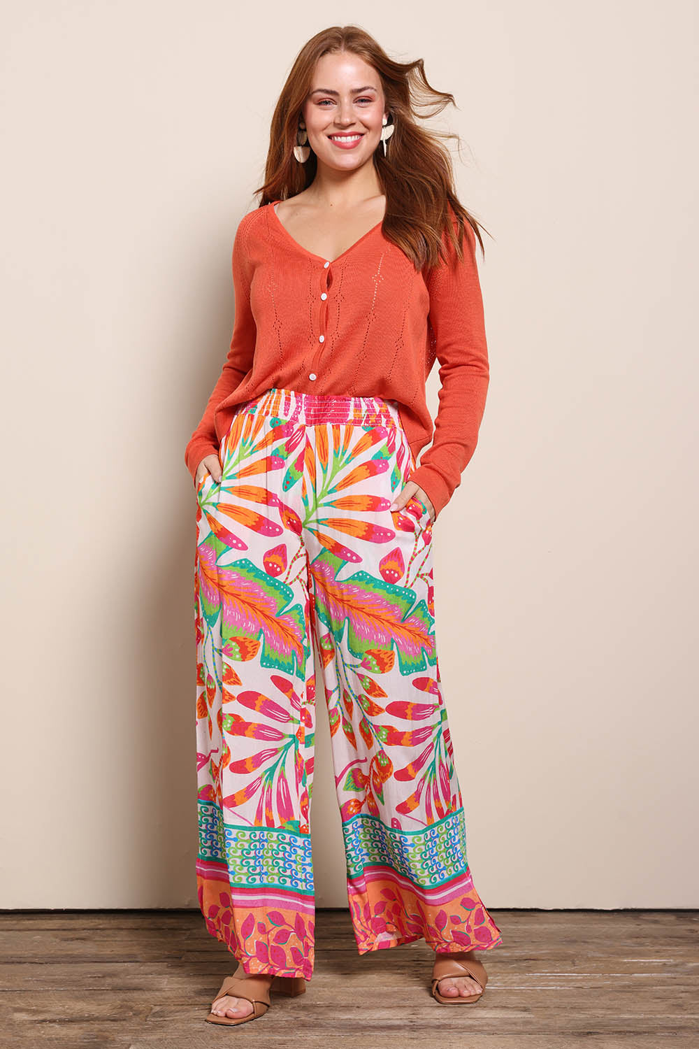 Model Georgiel wearing size 10 of the Wide Leg Pull On Pant – Fern in colour Fern, from the front