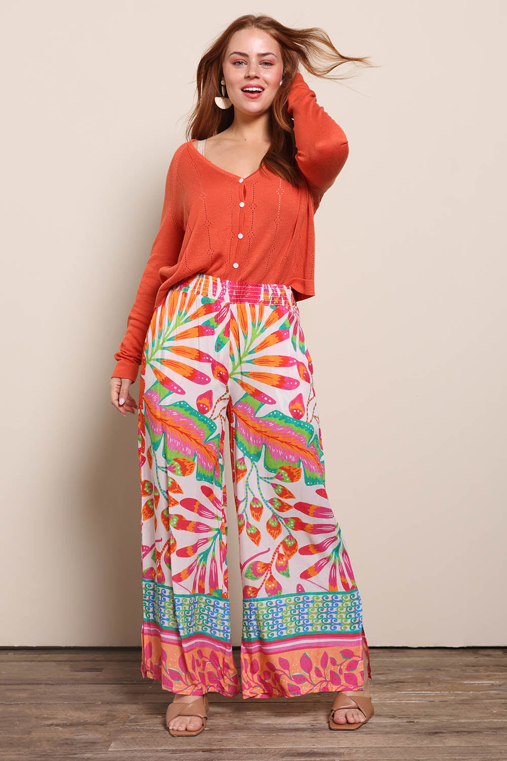 Model Georgiel wearing size 10 of the Wide Leg Pull On Pant – Fern in colour Fern, from the front