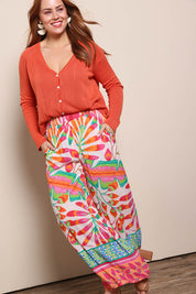 Model Georgiel wearing size 10 of the Wide Leg Pull On Pant – Fern in colour Fern, from the front