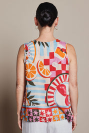 Model Katie wearing size 10 of the V Neck Tank in colour Picnic, from the back