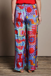 Model Katie wearing size 10 of the Straight Leg Pull On Pants in colour Lobster, from the back