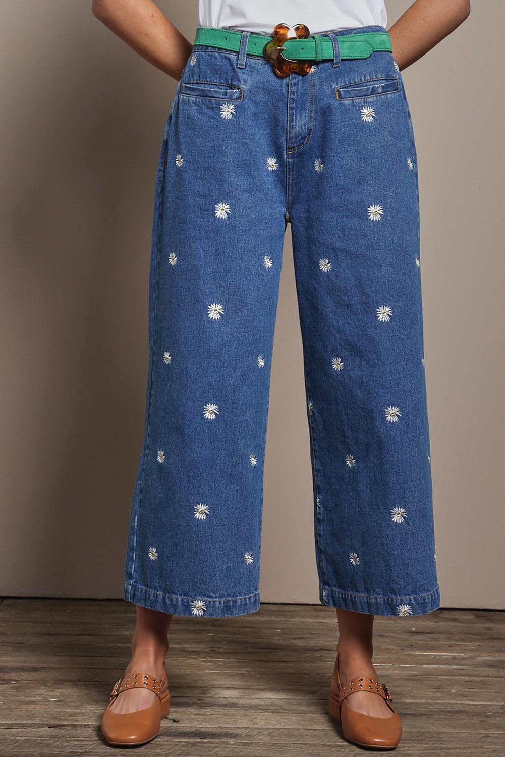 Model Madeline wearing size 10 of the Daisy Cotton Crop Jean in colour Daisy (Blue), from the front, cropped image