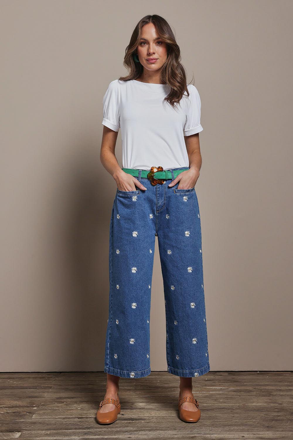 Model Madeline wearing size 10 of the Daisy Cotton Crop Jean in colour Daisy (Blue), from the front, showing the whole outfit