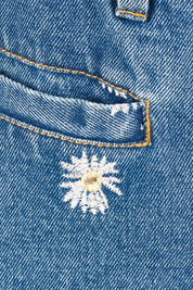 Product shot of the Daisy Cotton Crop Jean in colour Daisy (Blue), detail