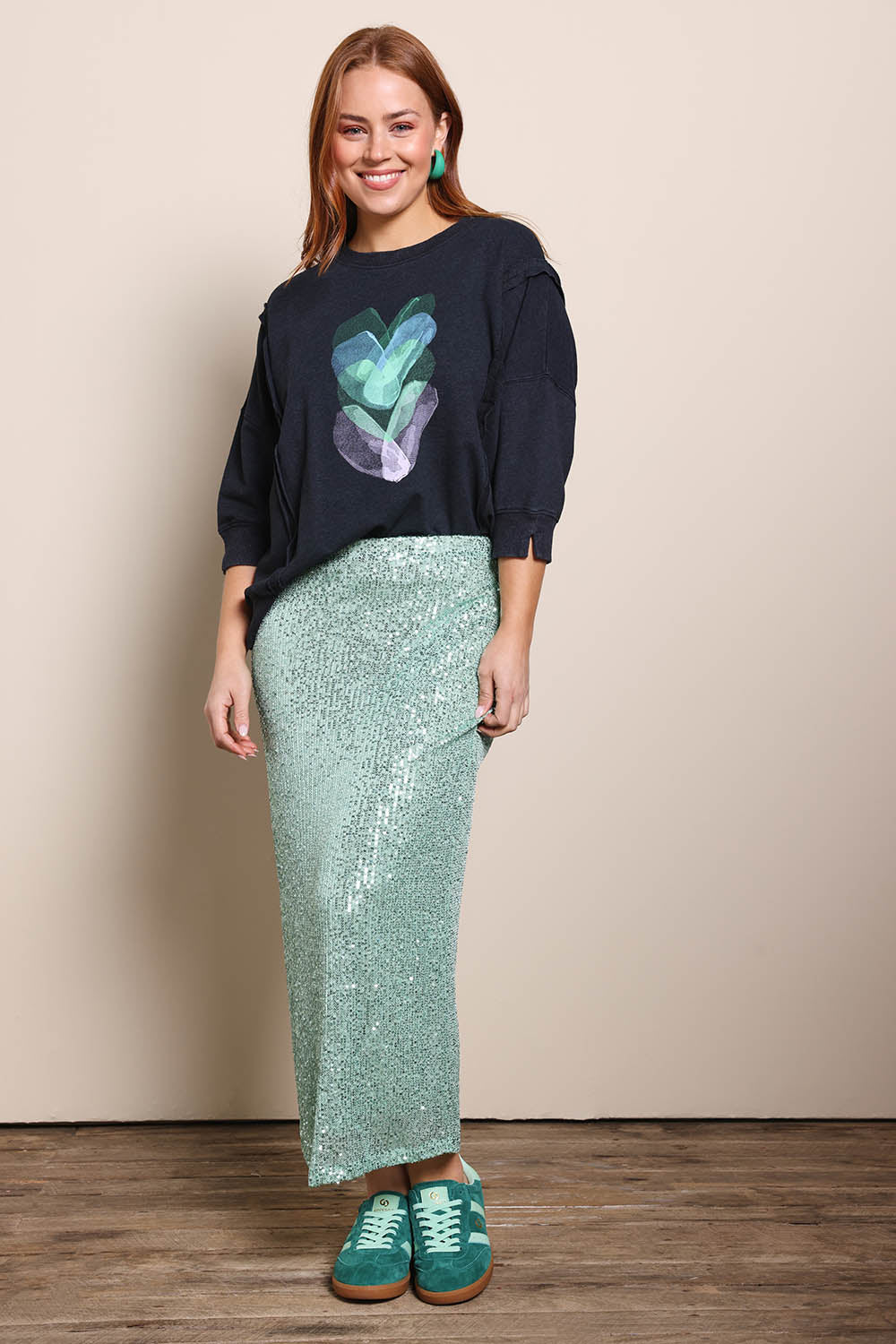 Model Georgiel wearing size 10 of the Heart 3/4 Sleeve Jumper – Blackblue in colour Blackblue, from the front
