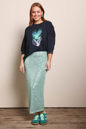 Model Georgiel wearing size 10 of the Heart 3/4 Sleeve Jumper – Blackblue in colour Blackblue, from the front