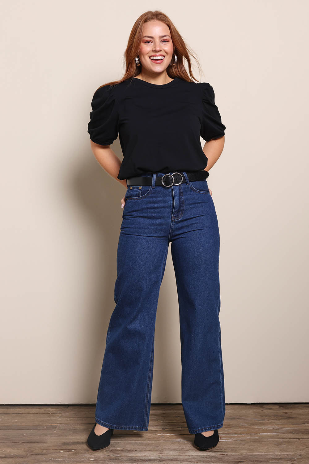 Model Georgiel wearing size 10 of the Cotton Jersey Puff Sleeve Top – Black in colour Black, from the front