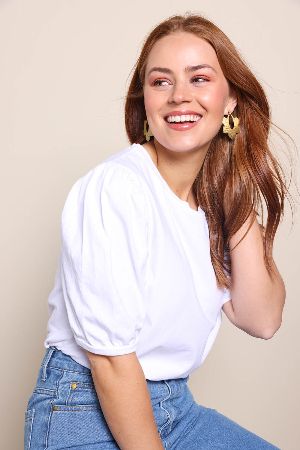 Model Georgiel wearing size 10 of the Cotton Jersey Puff Sleeve Top – White in colour White, from an angle