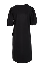 Product shot of the Cotton Jersey Puff Sleeve Dress in colour Black (Black), from the back