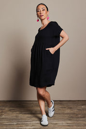 Model Katie wearing size 10 of the Viscose Linen Short Sleeve Dress in colour Black (Black), from the front, showing the whole outfit