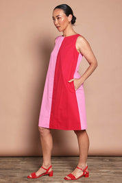 Model Katie wearing size 10 of the Cotton Ain colourLine Split Shift Dress - Redpink (Red), from the front, showing the whole outfit