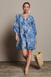 Model Katie wearing size 10 of the Cotton Sundress in colour Shell (Blue), from the front, showing the whole outfit