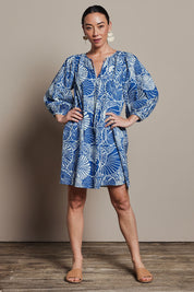 Model Katie wearing size 10 of the Cotton Sundress in colour Shell (Blue), from the front, showing the whole outfit