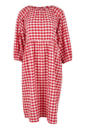 Product shot of the Cotton Empire Waist Dress in colour Ginghamred (Red), from the front