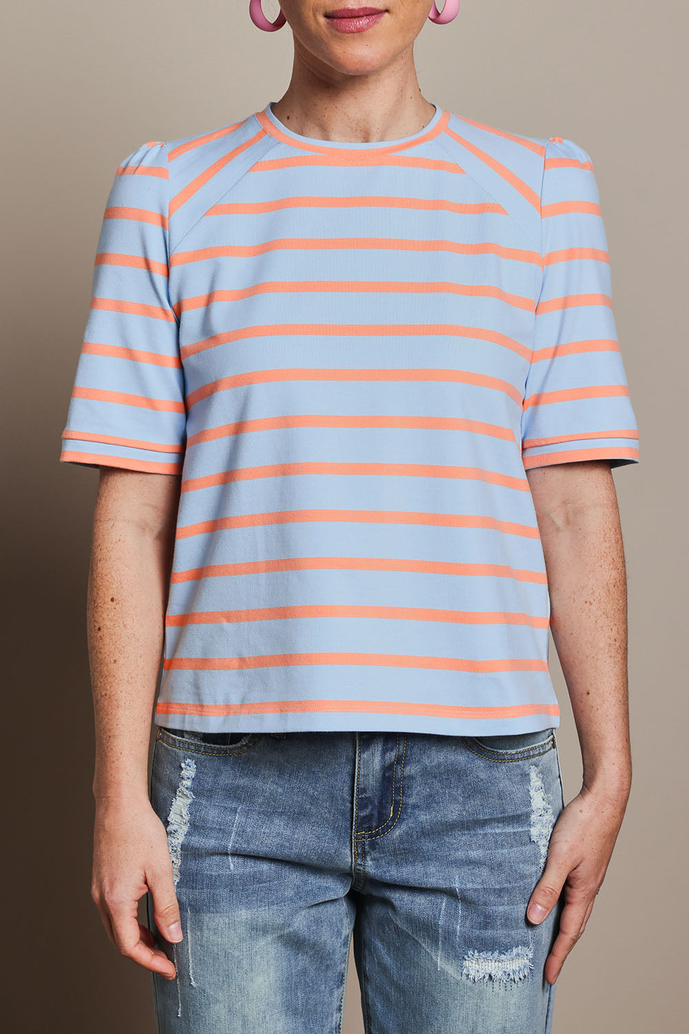 Model Katie wearing size 10 of the Cotton Stripe Puff Sleeve Top in colour Blueorange (Blue), from the front, cropped image