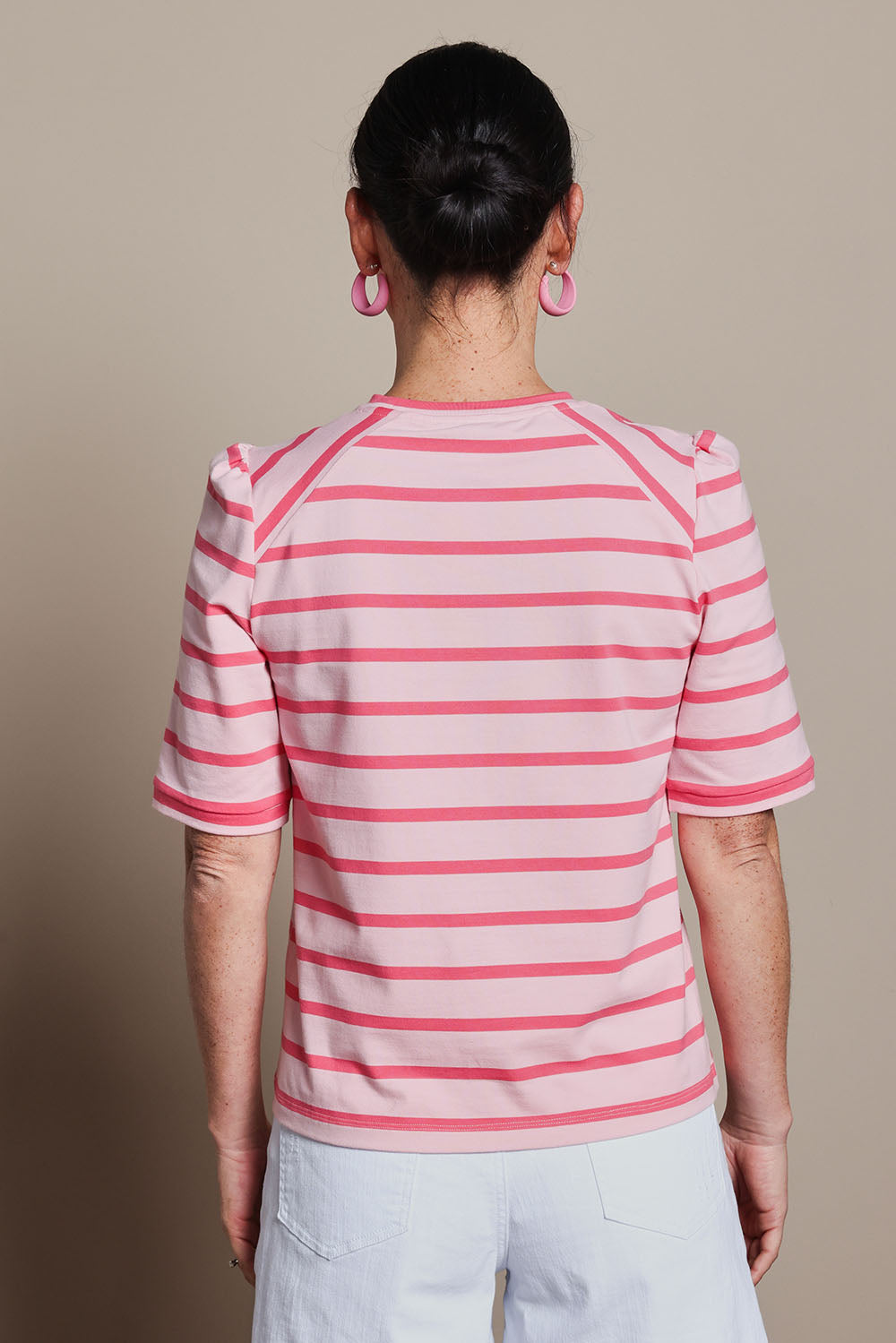 Model Katie wearing size 10 of the Cotton Stripe Puff Sleeve Top in colour Pink (Pink), from the back