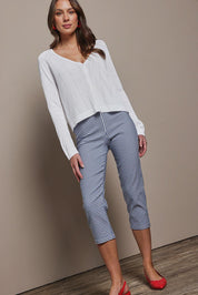 Model Madeline wearing size 10 of the Check Cotton Pull On Pant in colour Blue (Blue), from the front, showing the whole outfit