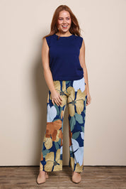 Model Georgiel wearing size 10 of the Printed Straight Leg Pull On Pant – Amberflora in colour Amberflora, from the front