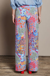 Model Katie wearing size 10 of the Printed Straight Leg Pull On Pant in colour Petalpop, from the back
