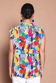 Model Katie wearing size 10 of the Frill Flutter Top in colour Jazzpop, from the back