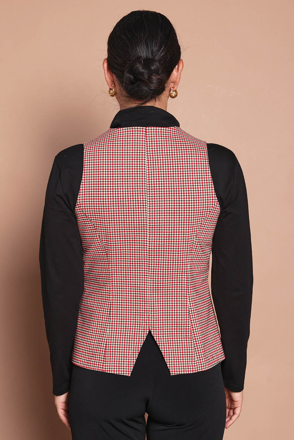 Model Katie wearing size 10 of the Stretch Check Vest in colour Redcheck (Red), from the back