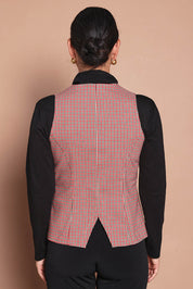 Model Katie wearing size 10 of the Stretch Check Vest in colour Redcheck (Red), from the back