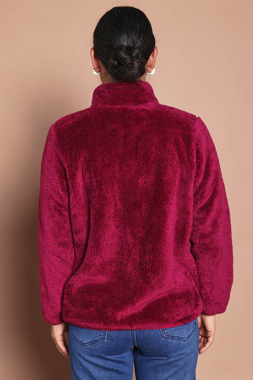 Model Katies wearing size 10 of the Fluffy Jacket - Cerise in colour Cerise, from the back