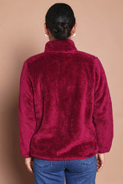 Model Katies wearing size 10 of the Fluffy Jacket - Cerise in colour Cerise, from the back