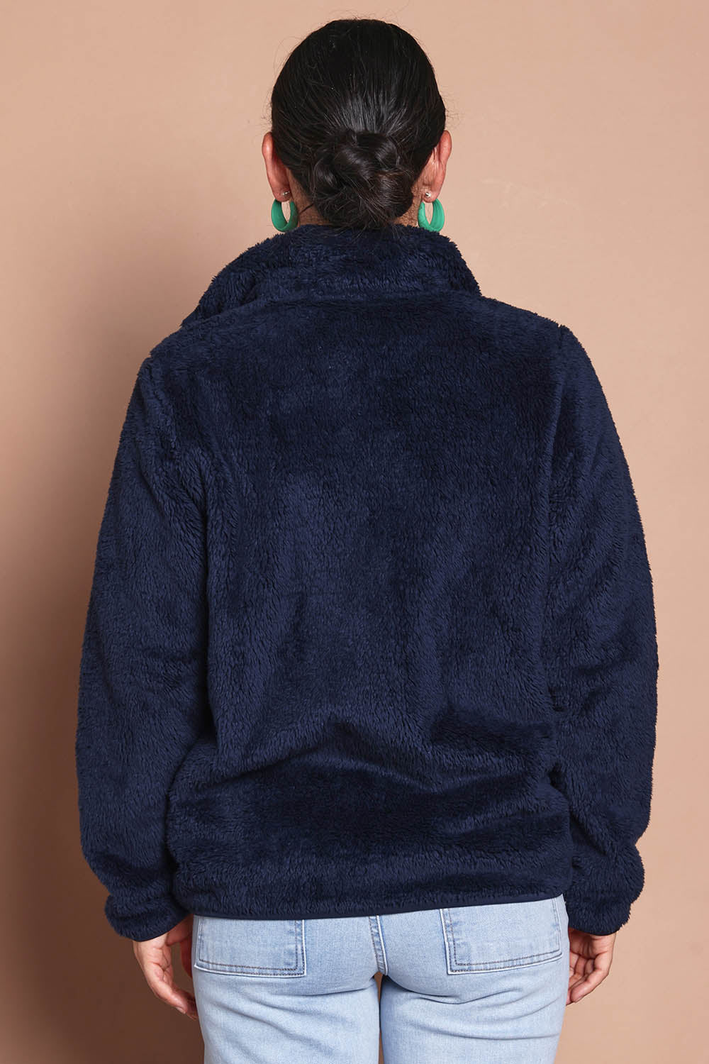 Model Katies wearing size 10 of the Fluffy Jacket - Navy in colour Navy, from the back