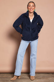 Model Katies wearing size 10 of the Fluffy Jacket - Navy in colour Navy, from the front