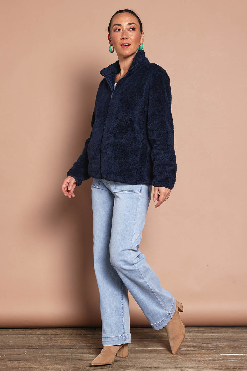 Model Katies wearing size 10 of the Fluffy Jacket - Navy in colour Navy, from the front