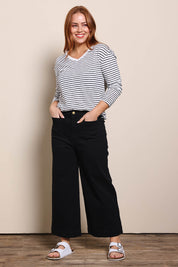 Model Georgiel wearing size 10 of the Cropped Denim Patch Pocket Jean – Black in colour Black, from the front
