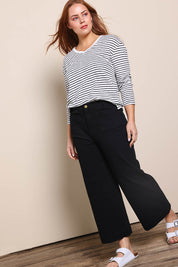 Model Georgiel wearing size 10 of the Cropped Denim Patch Pocket Jean – Black in colour Black, from the front