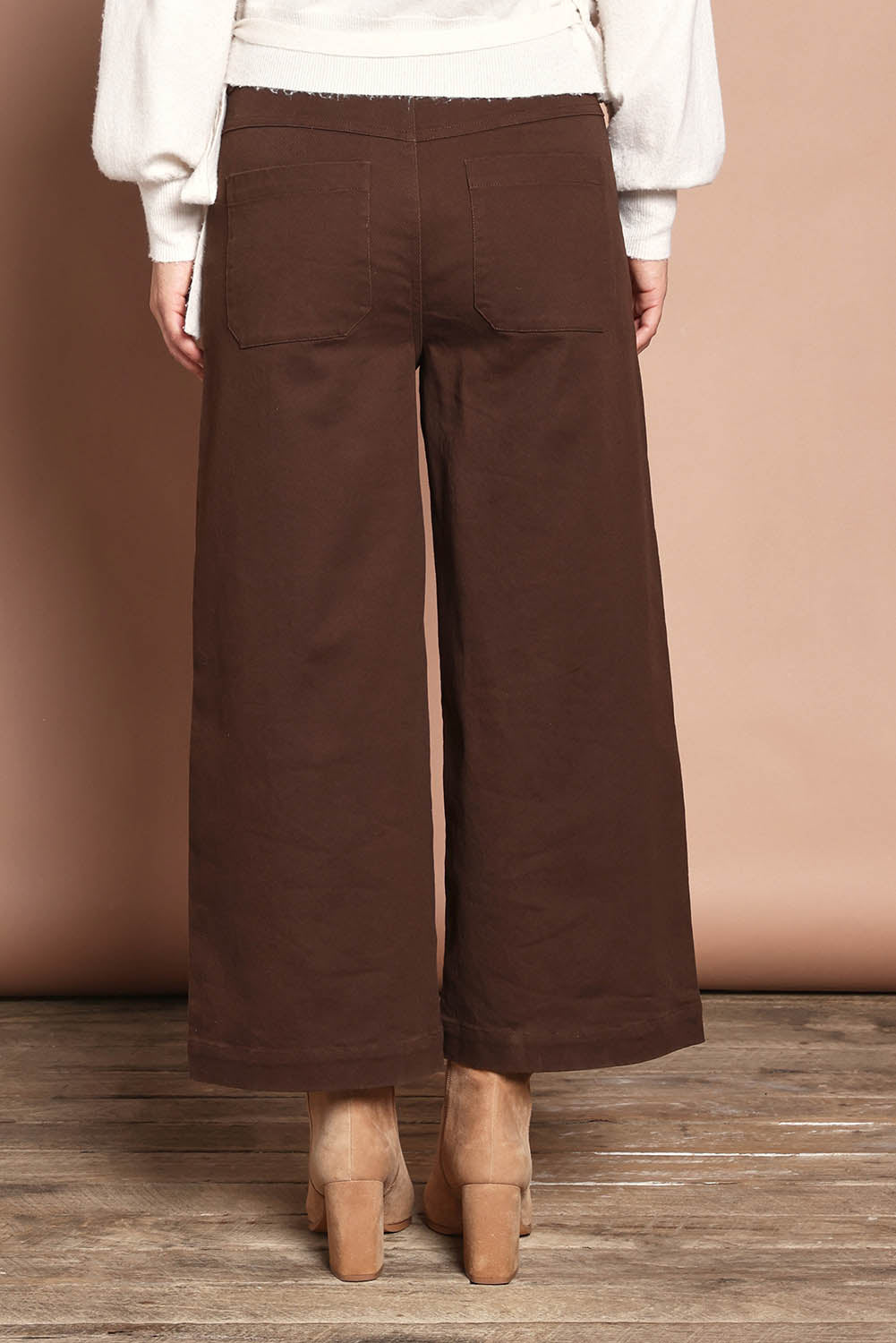 Model Katie wearing size 10 of the Cropped Denim Patch Pocket Jean in colour Chocolate, from the back