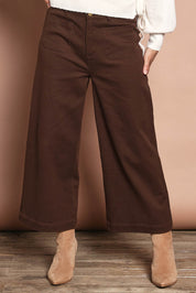 Model Katie wearing size 10 of the Cropped Denim Patch Pocket Jean in colour Chocolate, from the front, cropped image