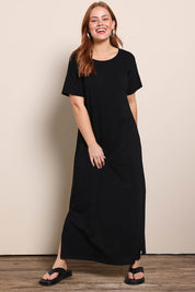 Model Georgiel wearing size 10 of the Cotton Jersey T-Shirt Dress – Black in colour Black, from the front