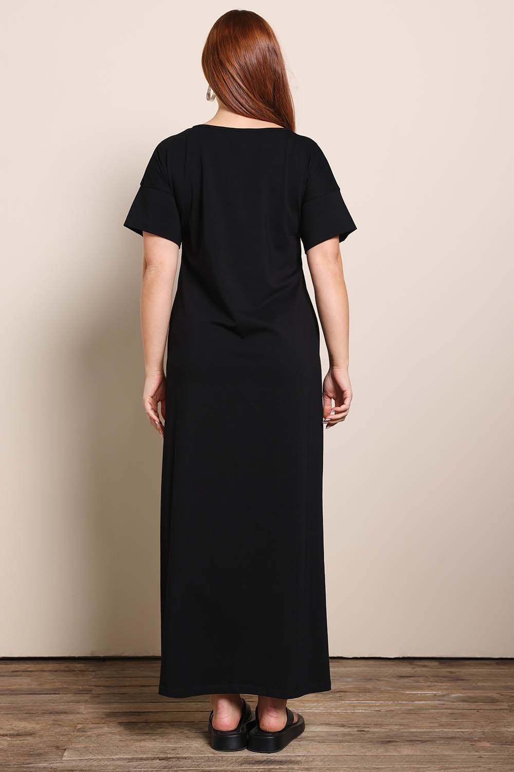 Model Georgiel wearing size 10 of the Cotton Jersey T-Shirt Dress – Black in colour Black, from the front