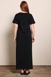 Model Georgiel wearing size 10 of the Cotton Jersey T-Shirt Dress – Black in colour Black, from the front
