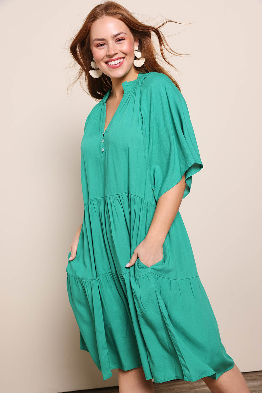 Model Georgiel wearing size 10 of the Relaxed Tiered Dress – Herb in colour Herb, from the front