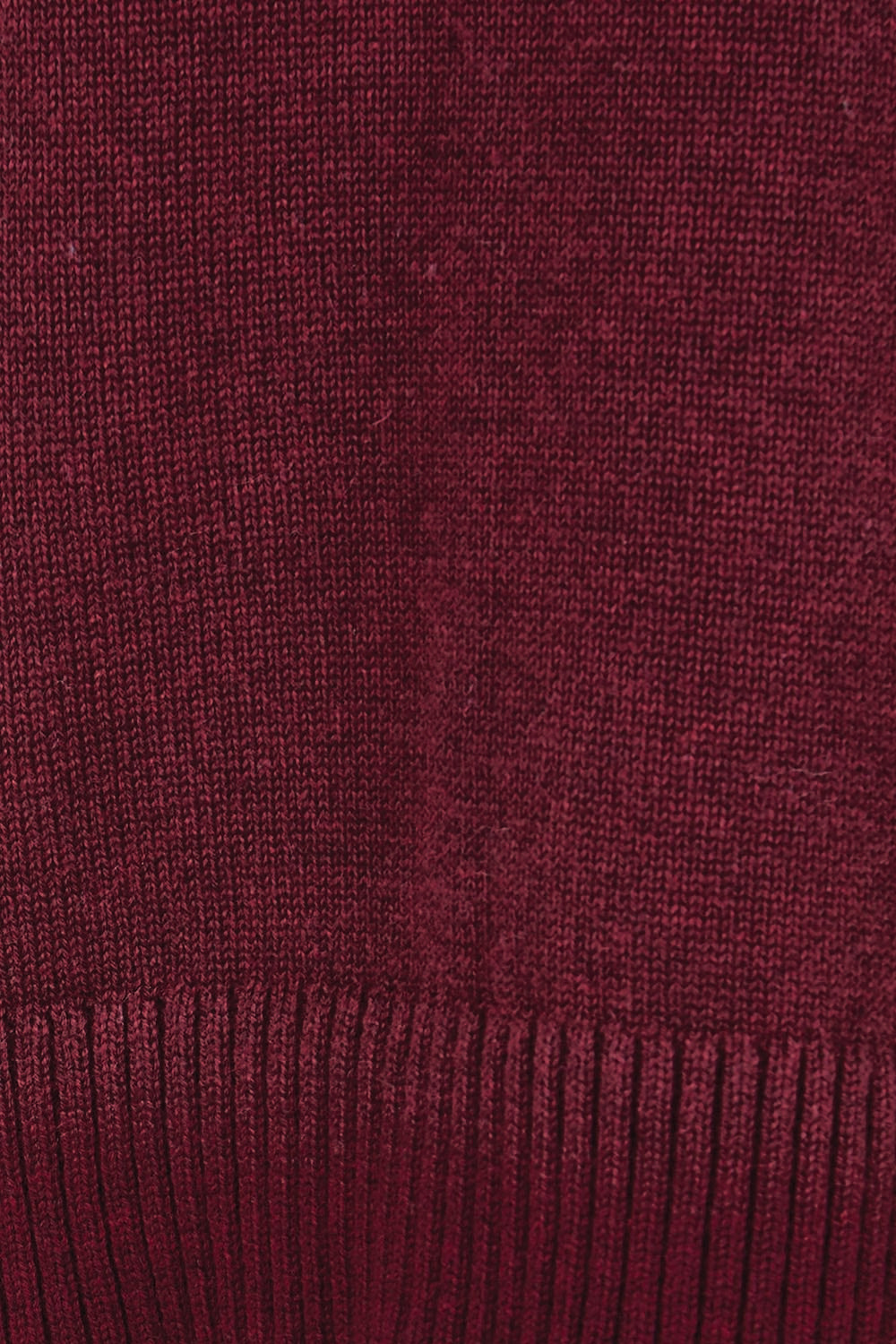 Product shot of the Cotton Wool Cashmere Jumper – Burgundy in colour Burgundy, showing detail