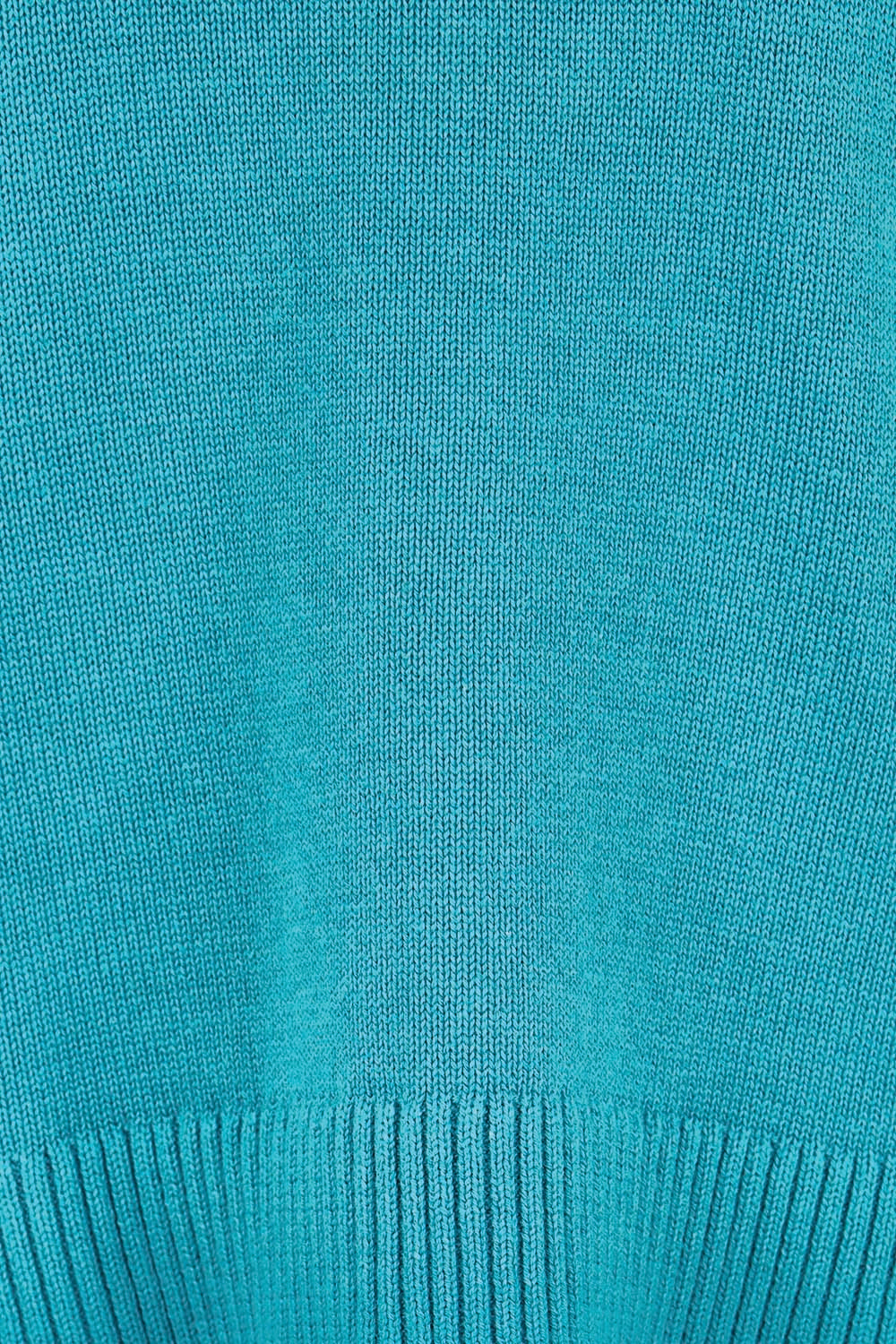 Product shot of the Cotton Wool Cashmere Jumper – Teal in colour Teal, showing detail
