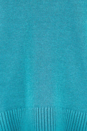 Product shot of the Cotton Wool Cashmere Jumper – Teal in colour Teal, showing detail