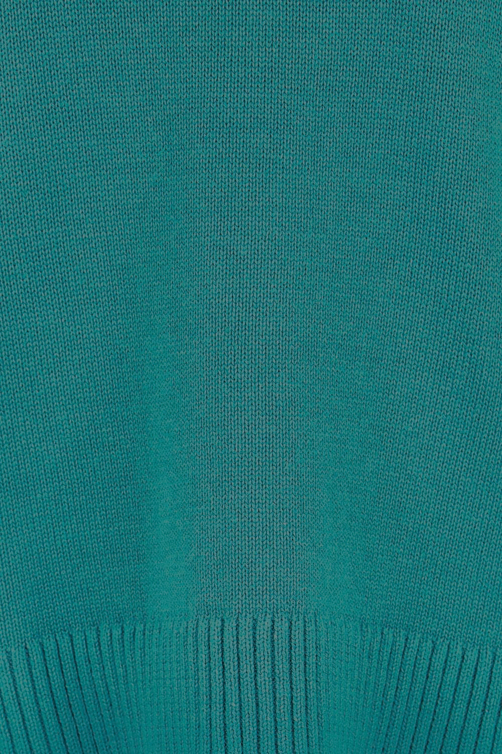 Product shot of the Cotton Wool Cashmere Jumper – Teal in colour Teal, showing detail